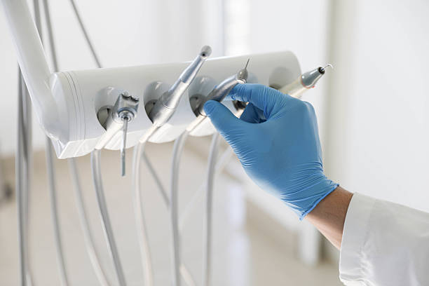 Professional Tooth Extraction technician working in Kennesaw State University, GA
